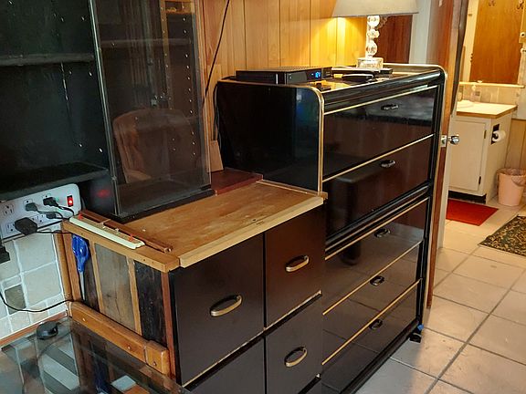 MBR dresser. View of private Bath Rm
Entry. Small TV