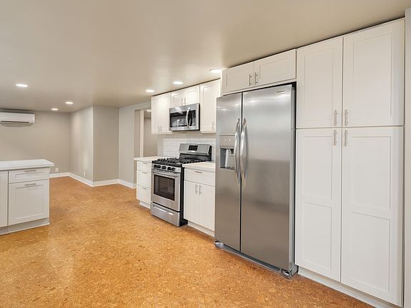 brand new stainless appliances including gas range as well as big pantry. Cork floors are soft and warm