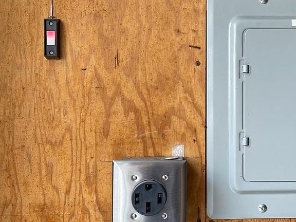 220v EV-ready outlet in private garage