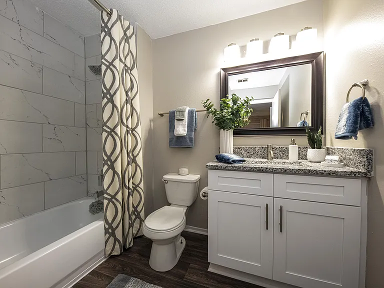 Spacious Bathroom + Granite Counters
