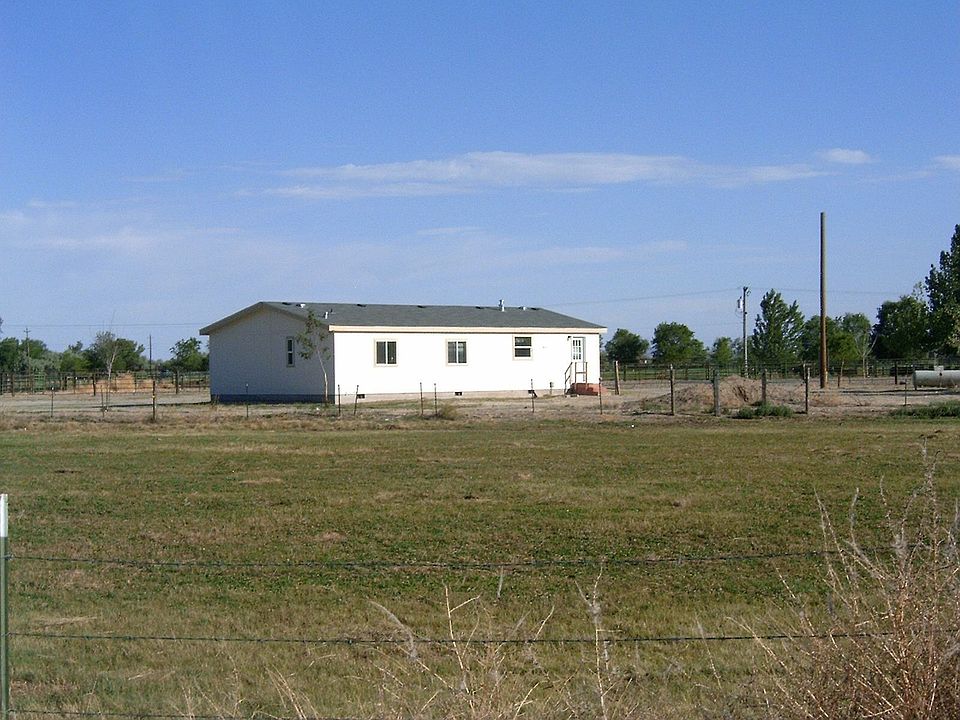 Newer Manufactured Home w Water-Righted Pasture and Training Facilities