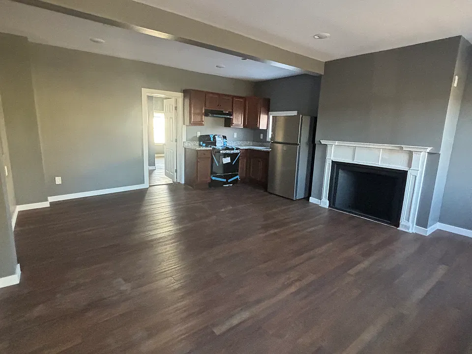 Open concept living, dining and kitchen.