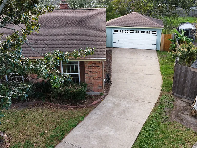 Aerial view of driveway and garage.