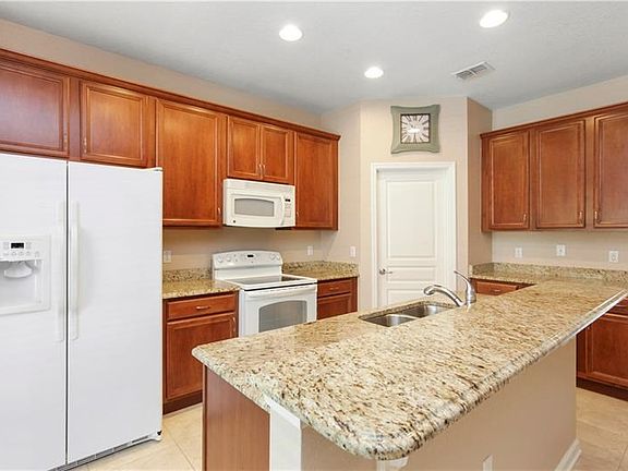 granite counters and 42" upper cabinets