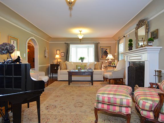 Nice Open Formal Living Room with Original Restored Light Fixtures
