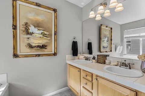 bathroom in main room, bathtub near window