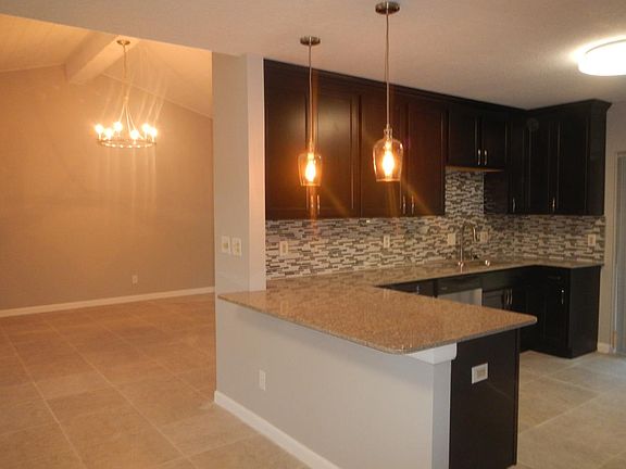 Silestone countertop with hardwood cabinets