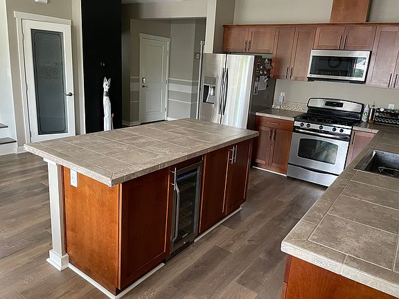 5th image of 6406 Udall Ave SE