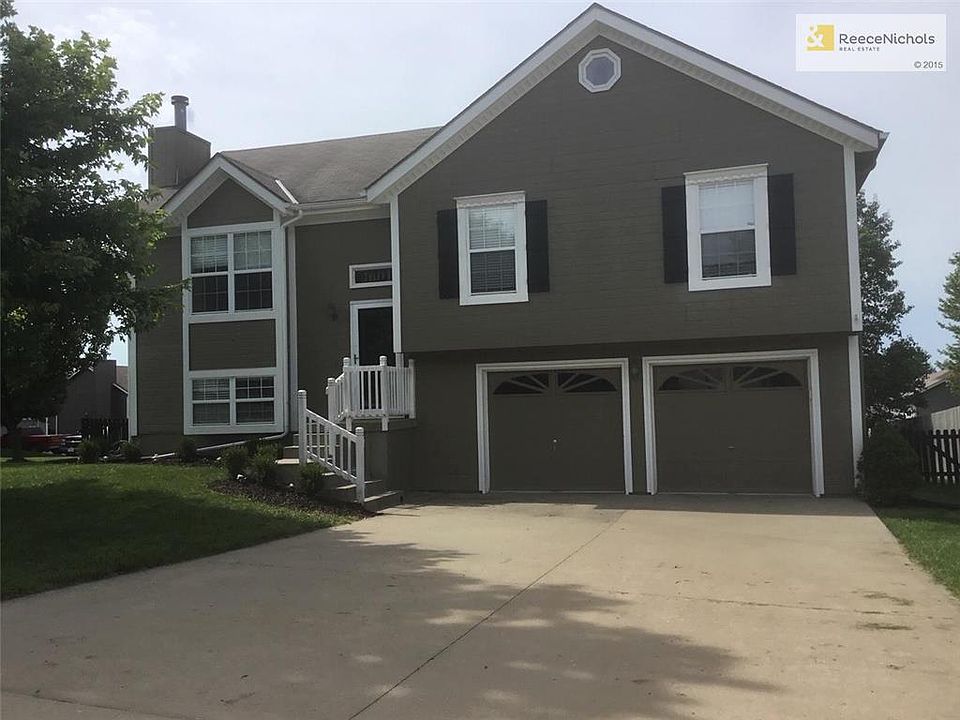 House sits on a large lot.