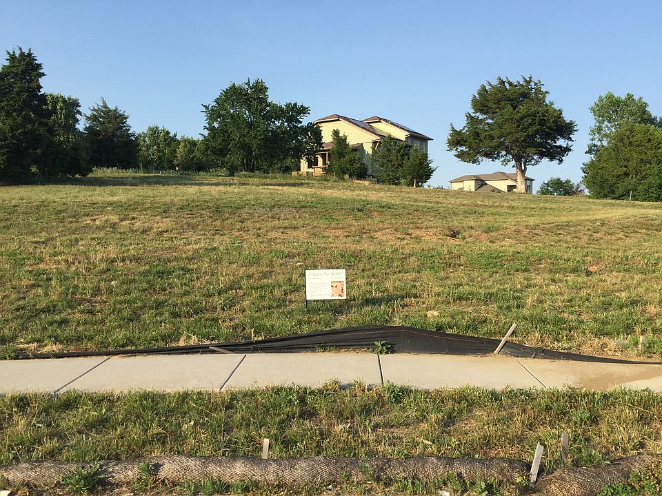 Lot to right of sign