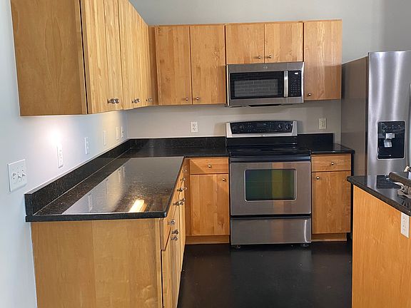 Maple cabinets, stone counter tops
