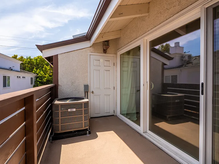 Balcony and extra storage space off primary bedroom