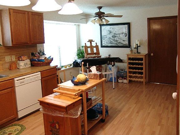 Breakfast nook next to large, bright windows
