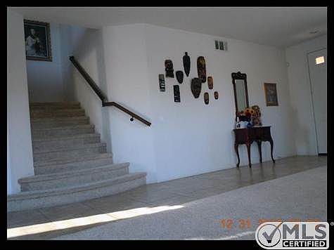 staircase offers landing mid way.