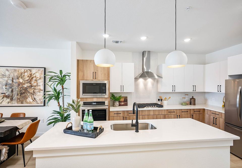 Stainless steal appliances and 52 bottle wine fridge.