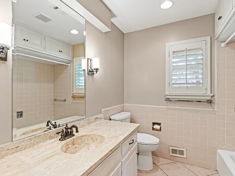 Hall bath and bath for third bedroom.