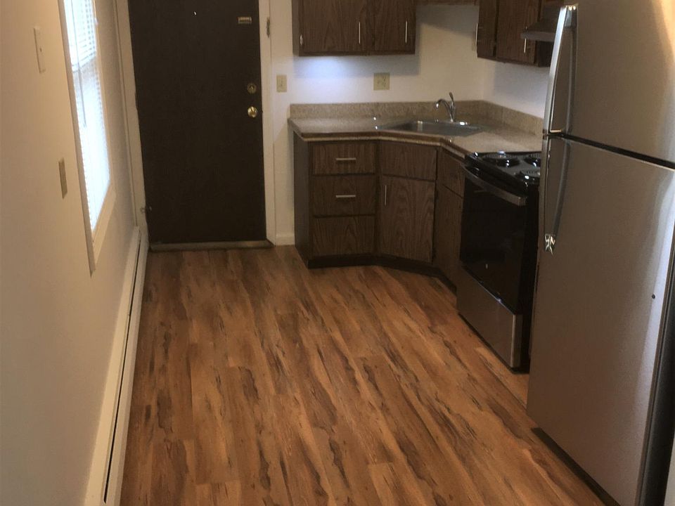 Kitchen with all new Stainless Steel appliances and new flooring.
