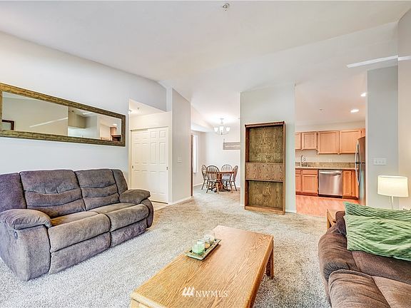 Another view from living area into kitchen and dining area 