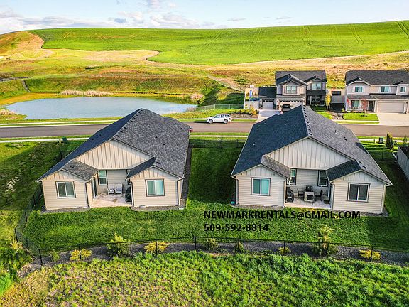 BACK YARD, FENCE SHARED WITH ADJACENT HOME