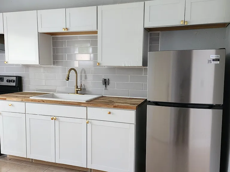 New cabinets and refrigerator