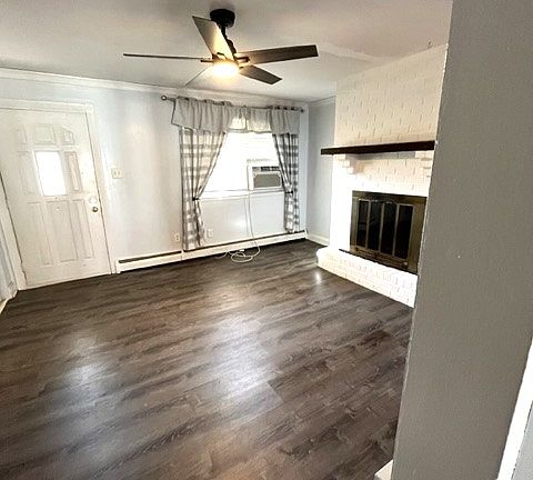 Family room with wood burning fire place