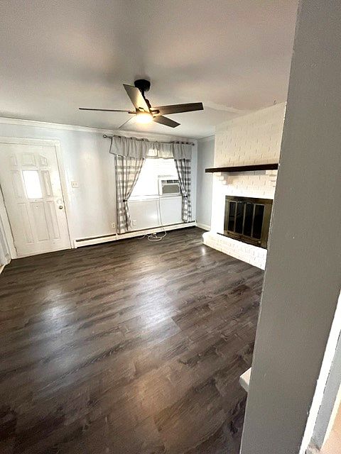 Family room with wood burning fire place