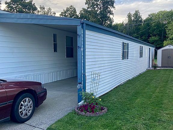 Carport will hold 3 cars