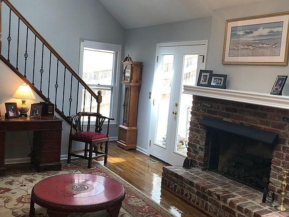 Den with back stairs