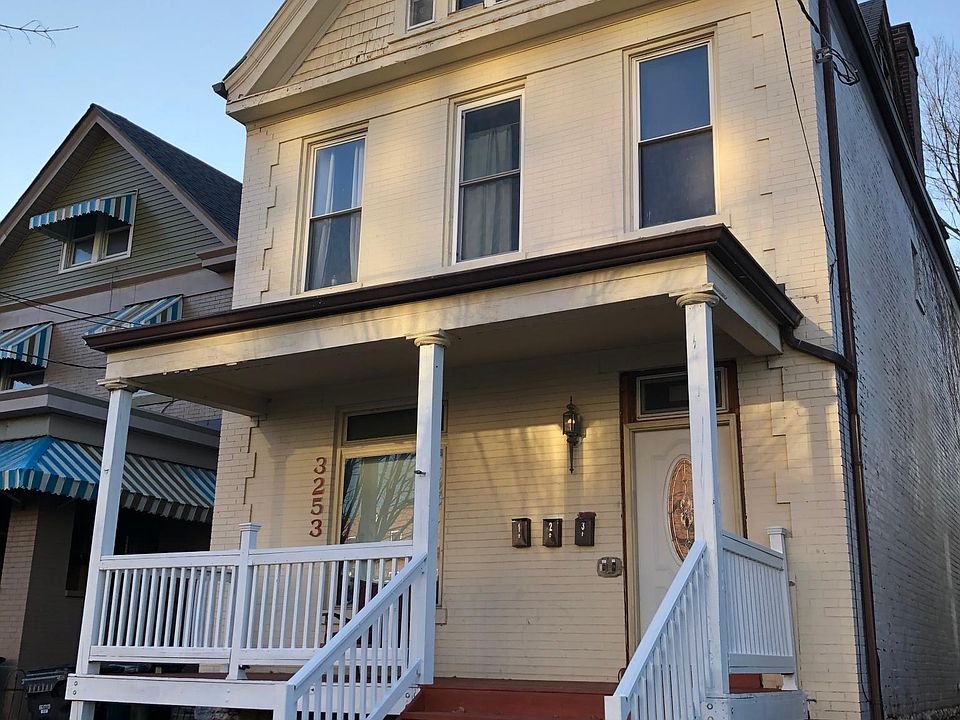 House front view. Newly painted entry door and deck. Newly stained front deck flooring and steps. Rest of the house exterior will be renovated in April 2022.