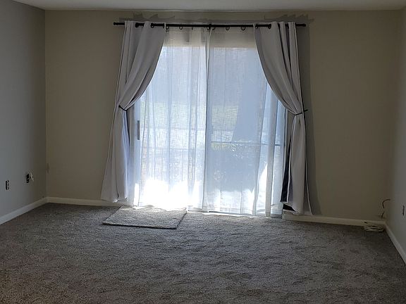 Living room- New Flooring- Carpet- Double curtain Rod Sliding door 
Slider to be upgraded...