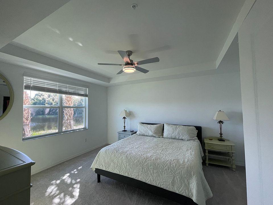 Master bedroom with king sized bed & wall mounted new TV