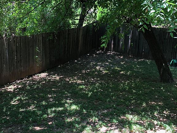 fenced back yard