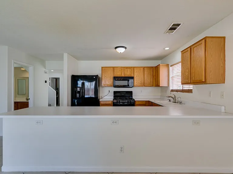 5025 Glittering Star Ct N — Photo 31