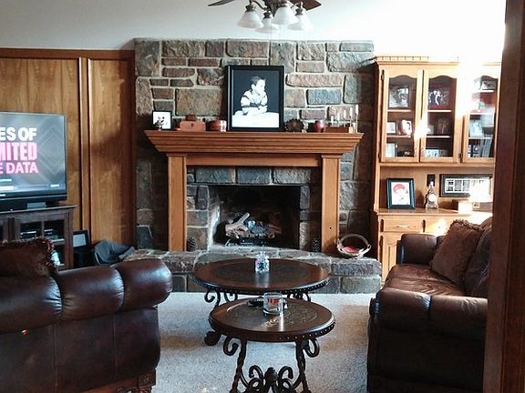 Living area with rock fireplace