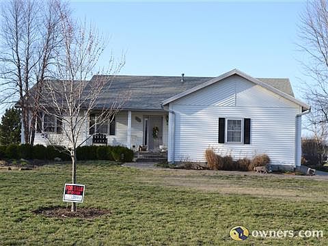 Front of house/paver sidewalk to door