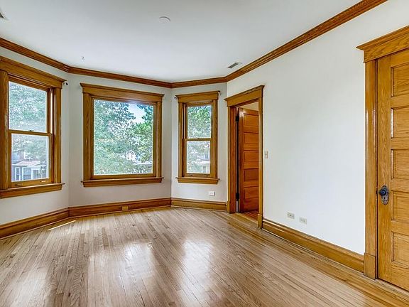 Street facing living room with ample natural light