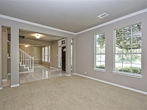 Second living open to entry and formal dining.