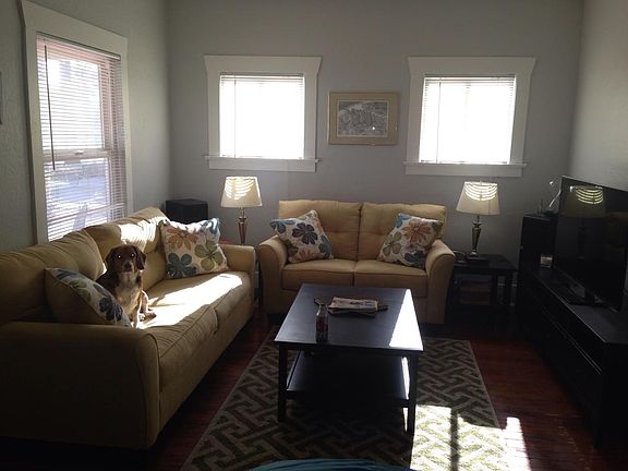 Nice size living room with original wood flooring