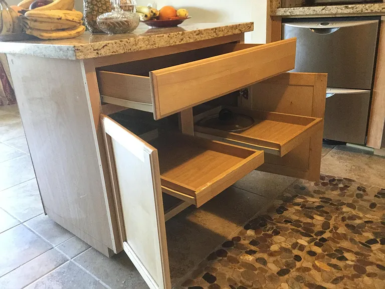 The island with sliding shelves.