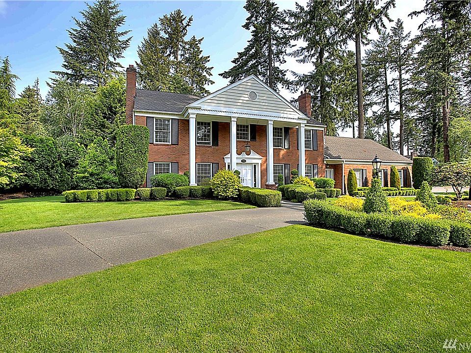 Stately two-story situated on a beautifully landscaped corner lot in the private gated community of Madera.