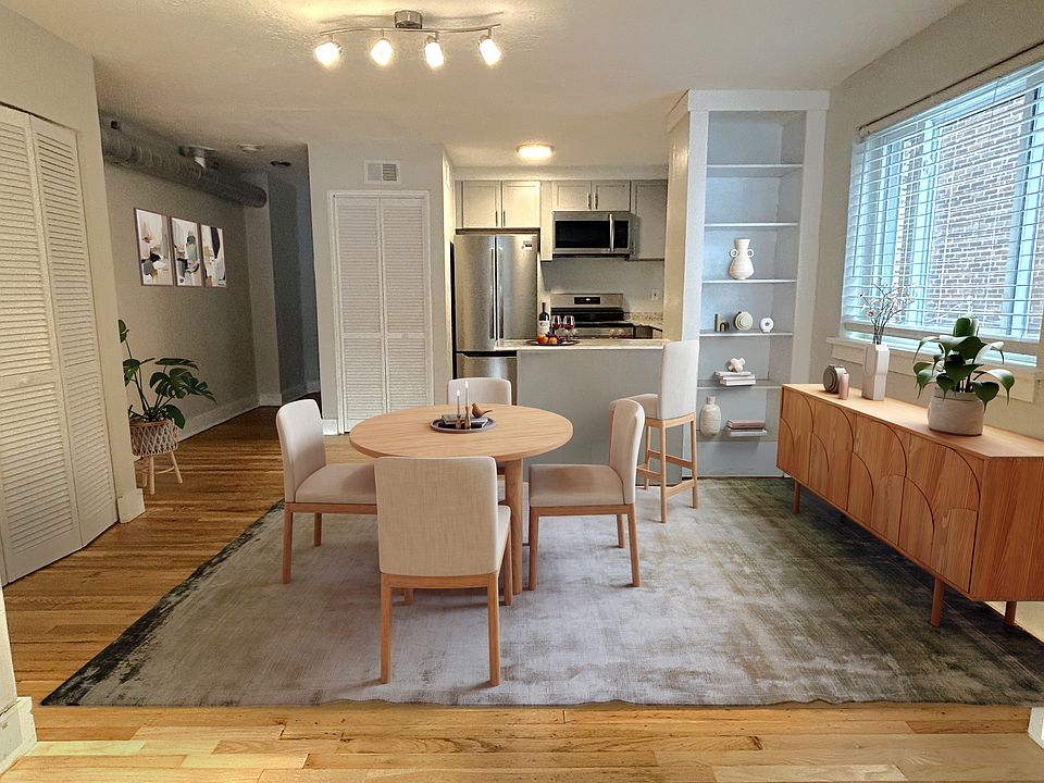 Dining Room with large new window, island, eat at bar, shelves, closet.