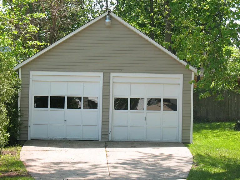 Off street parking in front of the garage for one vehicle