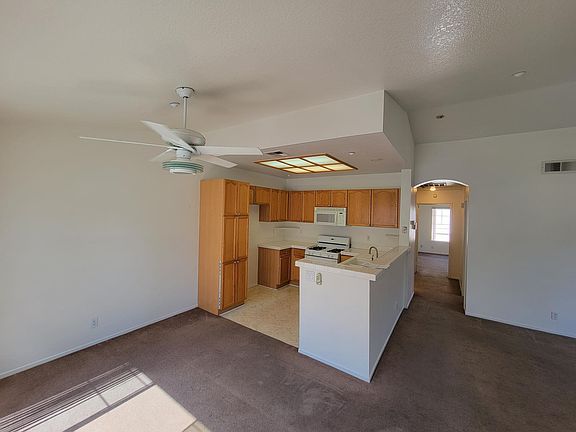 Dining room, kitchen and living room.