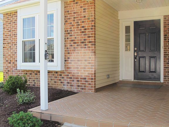 Covered & Tiled Front Entry 