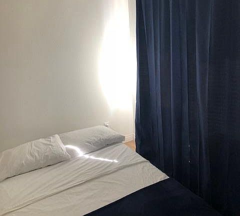 Upstairs loft with full bed, curtains