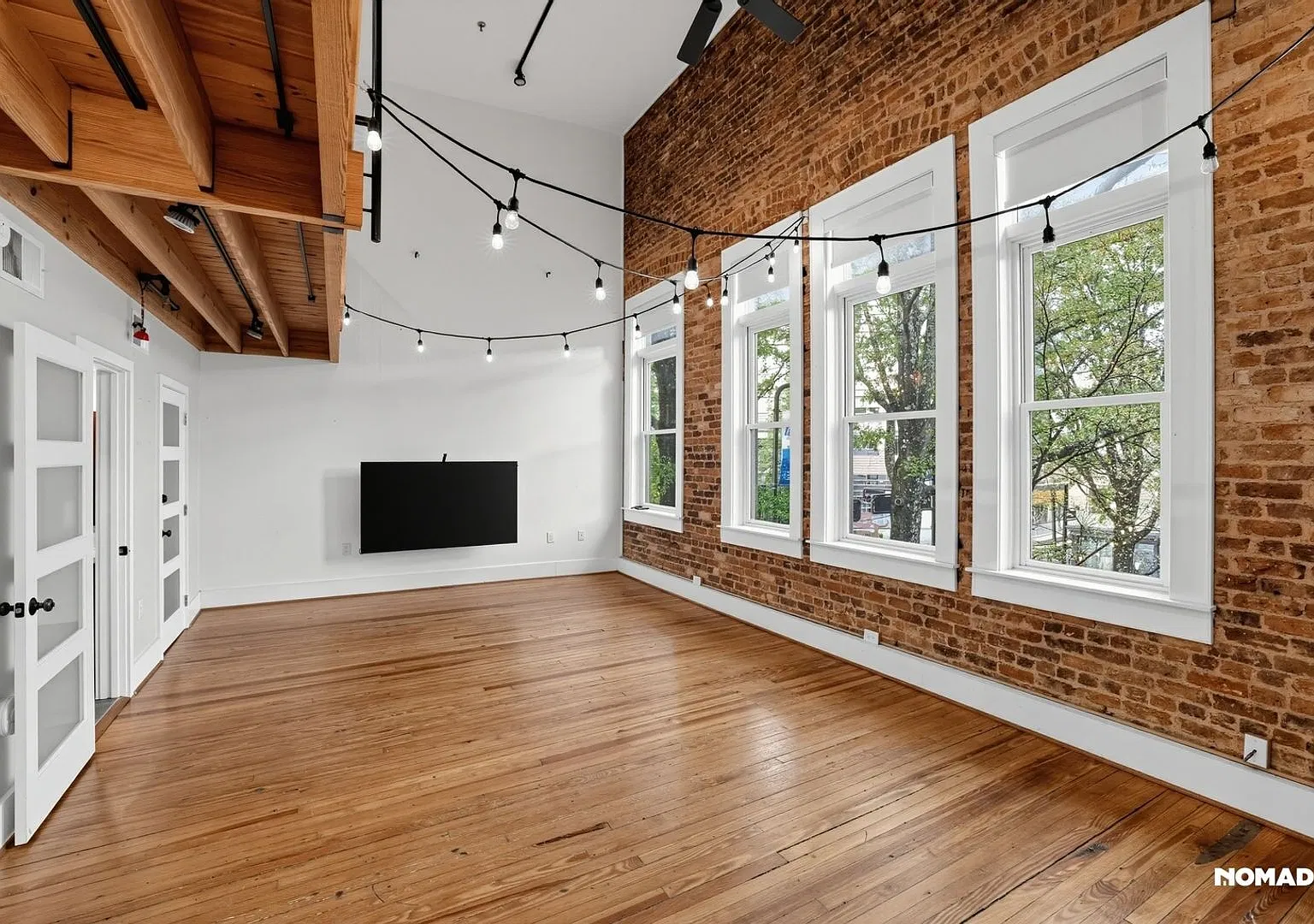 Huge Lofted Condo Overlooking Main Street — Photo 1