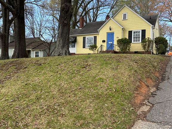 large front yard sloping up so you are considerably above the street level