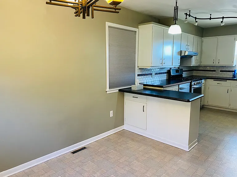 8837 Manor Ave — Photo 11