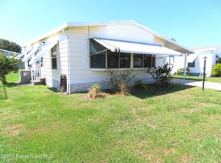 910 Dogwood Dr, Barefoot Bay, FL 32976