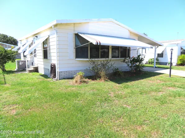 910 Dogwood Dr, Barefoot Bay, FL 32976